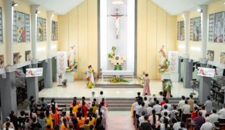 Church interior with spring flower arrangements
